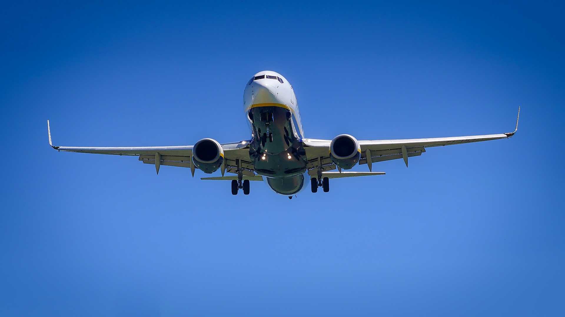 Airliner in blue sky